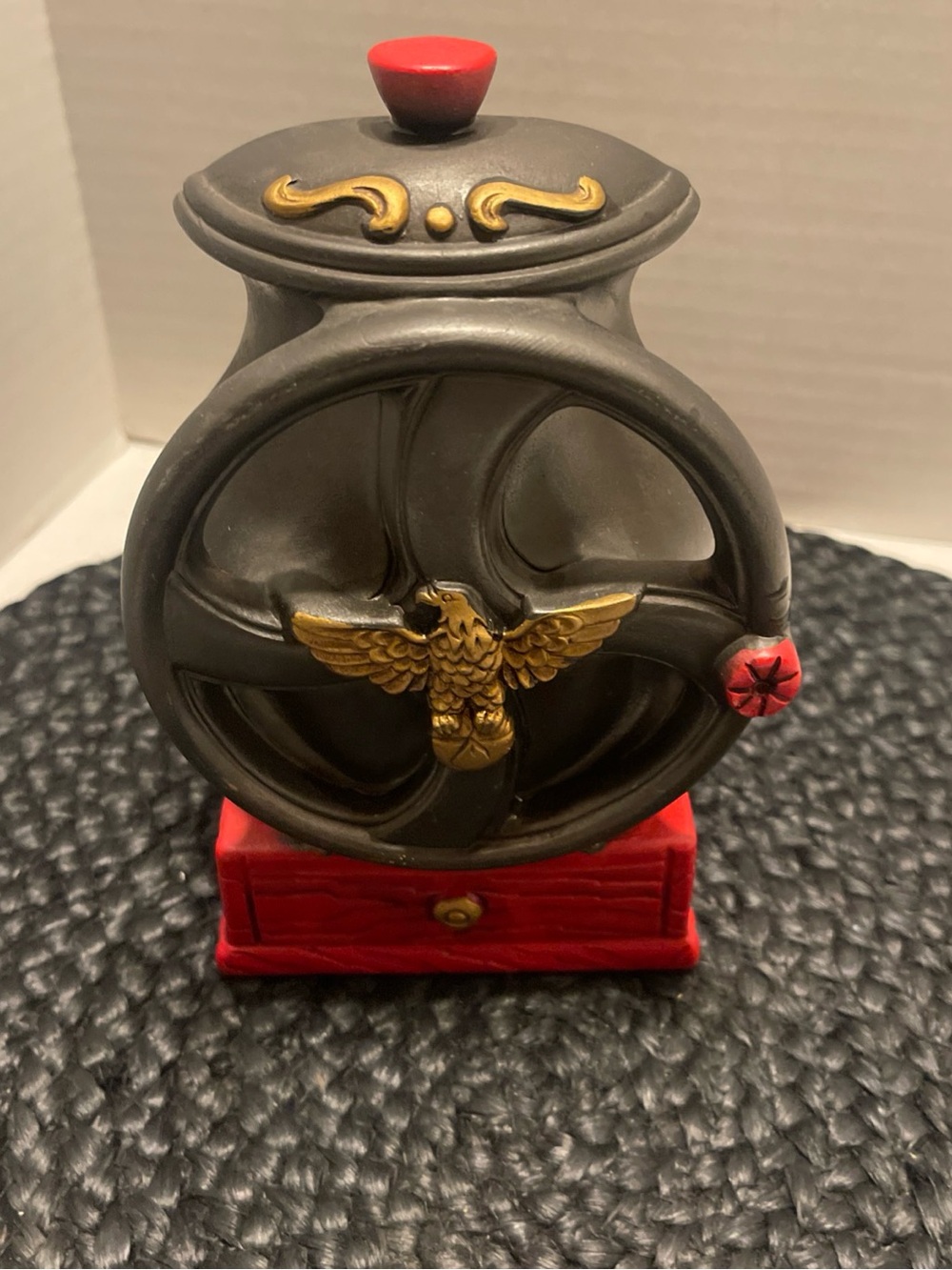 Decorative Red and Gold coffee grinder with Eagle Vintage planter pot